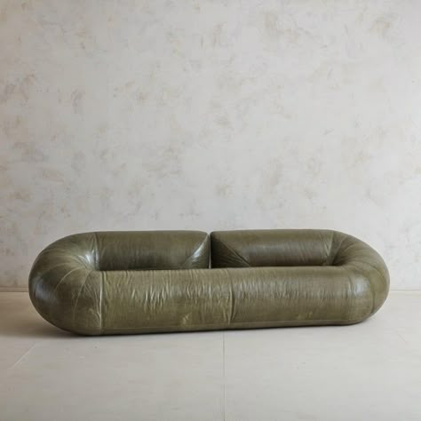 An incredibly rare Space Age ‘Zeppelin’ sofa designed by Walter Leeman for Velda in 1972. Only 20 copies of this sofa were produced. Monumental dimensions and the fluid, tubular structure give this sofa a sculptural aesthetic. The frame is exceptionally constructed of metal and features original, buttery soft olive green leather upholstery with a stunning, natural patina. Decorative tapered side seams and delicate stitching compliment the beautiful craftsmanship. Belgium, 1970s.      DIMENSIONS: 109"W x 36"D x 28H"; Seat Height: 16”H Free Standing Wall, Green Sofa, Funky Furniture, Space Age, Interior Furniture, Zeppelin, Green Leather, Leather Upholstery, Sofa Design