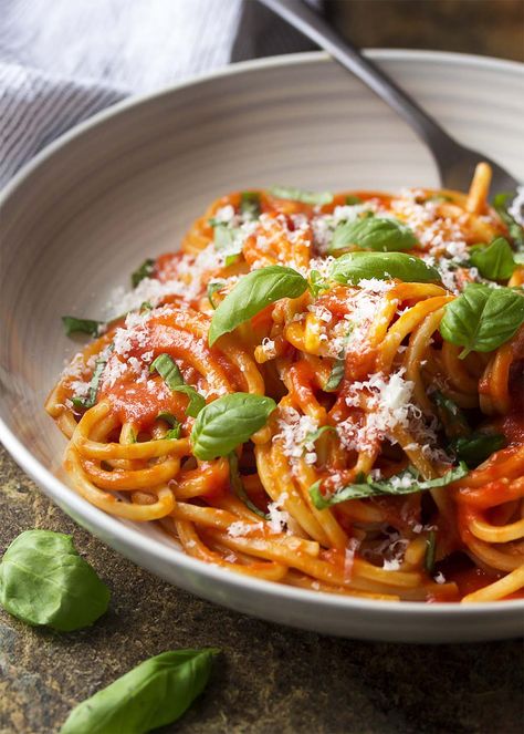 For an authentic Italian dinner, try my pasta al pomodoro! Spaghetti is tossed with a simple and delicious San Marzano tomato sauce and topped with basil and Parmesan in this easy recipe. | justalittlebitofbacon.com #italianrecipes #pastarecipes #easydinner #italian #spaghetti #pasta #tomatosauce Italian Sausage Pasta Bake, Italian Pasta Recipes Authentic, Italian Pasta Recipe, Authentic Italian Pasta, Chipotle Pasta, Tomato Sauces, Pomodoro Sauce, Pasta Al Pomodoro, Pasta With Tomatoes