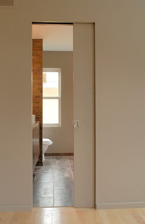 Bathroom Pocket Door Ideas, Bathroom Sliding Door Ideas, Pocket Door Bathroom, Hidden Bathroom Door, Modern Pocket Doors, Ensuite Layout, Pocket Doors Bathroom, Bathroom Sliding Door, Sliding Bathroom Door