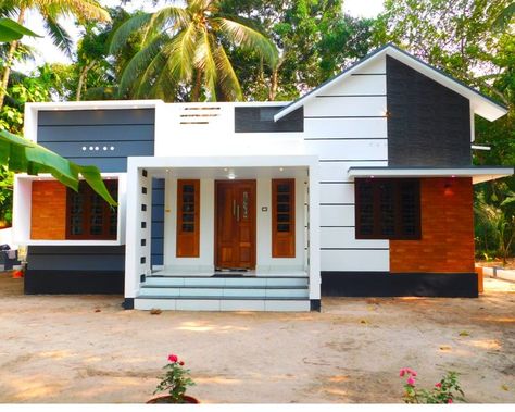 we share the highlights of a single floor kerala style home design with attractive interior and exterior design. The exterior of the house is given a white and gray combination color. BASIC DETAILS Location : vazhikulam (near cheruvallill temple)olakettiambalam , Mavelikara, Kerala owner : midhun, ph: 9947450603 Cost : 18 Lakhs area : About 1300sqft rooms : 3 , 2 attched Kerala House Design Single Floor, Gray Combination Color, House Design Single Floor, Budget Home Design, Low Budget House, Single Floor House Design, Combination Color, Kerala Home, Decor Shelves