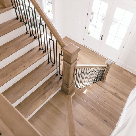 Our Easy Breezy "Frisco" custom stain, shown on our character rich live sawn white oak, is the perfect compliment to this traditional open concept home. This beautiful stain, can be applied to both our solid and engineered white oak flooring. Cochran's Lumber offers a variety of finishes and species that meets our client's specific needs and budget. Oak Floor Stains, Floor Stain Colors, Dragons Lair, European White Oak Floors, Wood Floor Colors, Hardwood Floor Colors, House Redo, Kitchen Updates, White Oak Hardwood Floors