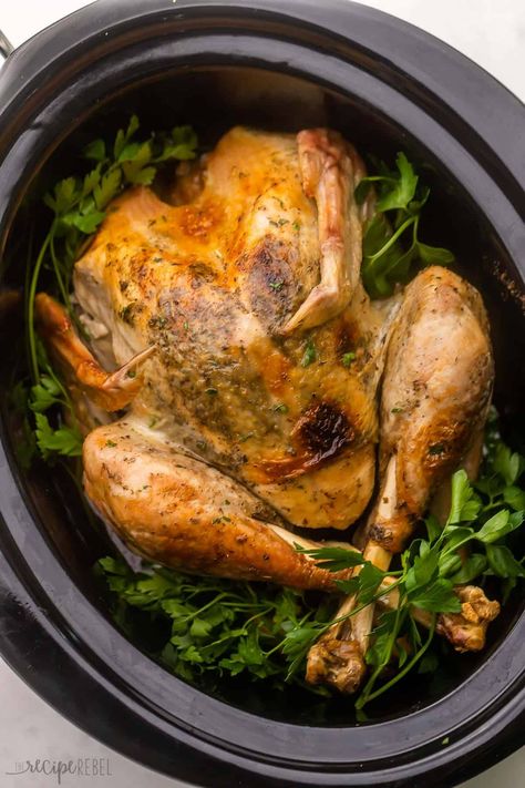 Crockpot Turkey with Garlic Butter is my go-to method for cooking a whole turkey! This is the easiest way you'll ever prepare the whole bird and it always turns out juicy, tender, and flavorful as can be with all of that garlic butter. It's fail-proof! #crockpot #slowcooker #turkey | holiday meals | christmas dinner | thanksgiving dinner | dinner ideas | crockpot meals | slow cooker turkey | how to cook a whole turkey Slow Cooker Thanksgiving Turkey, Slow Cooker Bone-in Turkey Breast, Crock Pot Whole Turkey, Cooking A Turkey In A Crock Pot, Whole Turkey Breast In Crockpot, Keeping Turkey Warm In Crockpot, Cooking Turkey In Crockpot, Reheating Turkey In Crockpot, Crockpot Whole Turkey