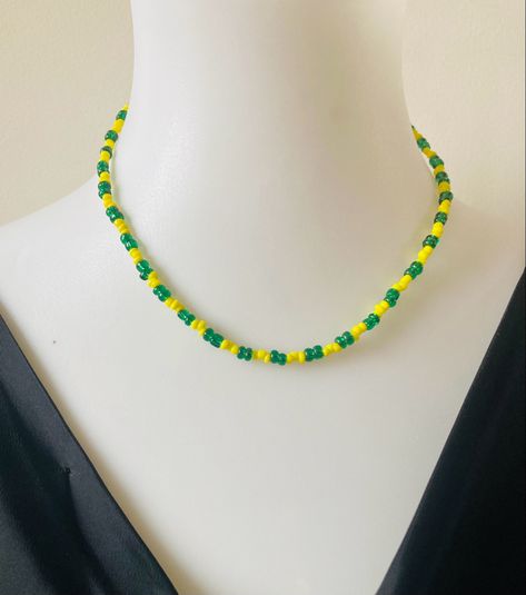 Yellow and green beaded necklace Yellow Beaded Necklace Gift, Yellow Adjustable Beaded Necklaces, Unique Yellow Beaded Necklace, Playful Yellow Beaded Necklaces, Yellow Flower-shaped Beaded Necklaces With Colorful Beads, Green Beaded Necklace, Yellow And Green, Seed Bead Necklace, Green And Yellow