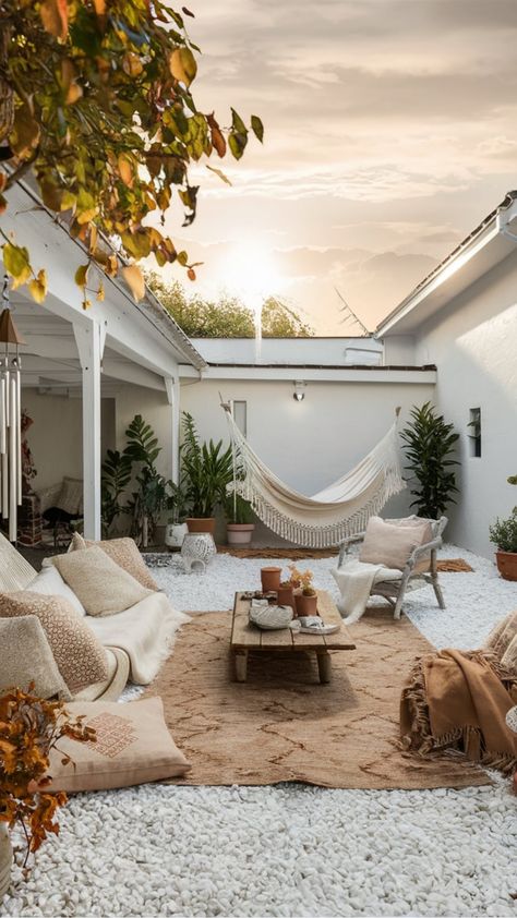 Transform your outdoor space into a bohemian oasis with these inspiring boho yard decor ideas. Embrace the laid-back, eclectic vibes of a boho outdoor space by mixing patterns, textures, and colors. Incorporate cozy rugs, floor cushions, and hanging planters to create a relaxing atmosphere perfect for lounging or entertaining. Infuse your boho yard with vintage finds, macramé accents, and plenty of greenery to achieve that effortlessly chic look. Southwestern Outdoor Patio, Scandi Mediterranean, Outdoor Boho Patio, Boho Yard, Boho Outdoor Patio, Yard Decor Ideas, Sectional Sofa Comfy, Boho Outdoor Space, Cozy Hammock