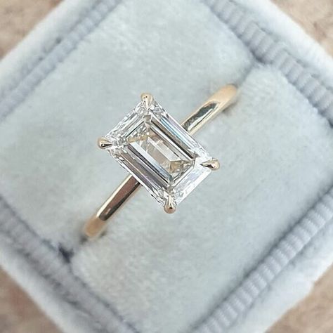 Sleek sellouts! 🤓. Order 2CT Emerald Cut Moissanite Engagement Ring, 14K Gold Hidden Halo Claw Prongs Ring, Anniversary Gift Ring, Bridal Wedding Ring at $116.52 #WhiteGoldRing #MoissaniteRing #EngagementRing #EmeraldCutRing #18kGoldRing #EmeraldEngagement #2ctEmeraldRing #WeddingRing #AnniversaryRing #EmeraldMoissanite Emerald Cut Solitaire, Hidden Halo Ring, Emerald Cut Engagement Ring, Ring Hidden Halo, Cathedral Setting, Emerald Cut Engagement, Emerald Cut Moissanite, Moissanite Necklace, Wedding Aesthetic