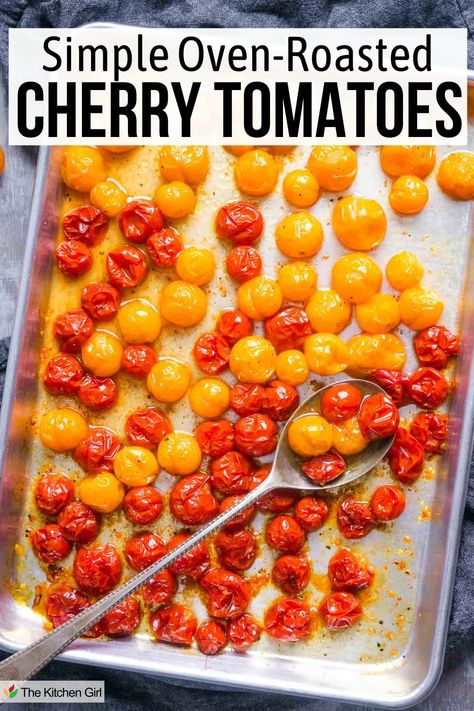 Red and yellow roasted cherry tomatoes and silver serving spoon on baking sheet. Title: Simple Oven-Roasted Cherry Tomatoes. Roast Cherry Tomatoes In Oven, How To Roast Cherry Tomatoes In The Oven, Roasting Cherry Tomatoes In Oven, Roasted Cherry Tomatoes Oven, Roasted Tomatoes Oven, Freezing Cherry Tomatoes, Oven Roasted Cherry Tomatoes, Cherry Tomatoes Recipe, Winter Foods