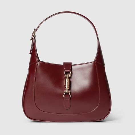 Shop the Jackie 1961 small shoulder bag in bordeaux at GUCCI.COM. Enjoy Free Shipping and Complimentary Gift Wrapping. Jackie 1961 Small Shoulder Bag, Thrift Manifestation, Gucci Jackie 1961, Trending Heels, Bag Names, Red Web, Crescent Shape, Fall 24, Gucci Shoulder Bag