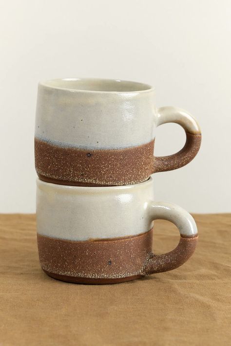 Ceramic Mugs: Crafted from clay, these mugs are often glazed for a smooth, shiny finish. They can feature various techniques like hand-painting or sculpting. Pottery Mugs: Similar to ceramic mugs but often created using traditional pottery techniques. These can include wheel-thrown mugs with unique textures and shapes. Clay Mugs: Made from raw clay, sometimes without glazing, giving them a rustic, natural look. Coffee Cups Ceramic Handmade, Pottery Coffee Mugs Handmade, Stoneware Mugs Handmade Ceramic, Red Clay Pottery Ideas, Pottery Wheel Mug, Ceramic Mug Ideas Handmade, Handbuilt Mug, Mug Shapes Pottery, Clay Mugs Handmade