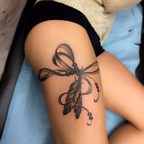 Thigh tattoos for women – Beautiful ideas and design tips %%page%% | | Deavita Tattoo Feather, Garter Tattoo, Thigh Tat, Bow Tattoo, Flower Sleeve, Leg Tattoos Women, Debbie Gibson, Thigh Tattoos Women, Thigh Tattoos