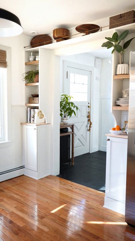 Galley Kitchen End Wall, Kitchen Cabinet Next To Doorway, Kitchen Split By Doorway, Wall To Wall Storage Cabinets, Bookshelf Over Doorway, Create Entryway In Living Room, Fridge Alcove, Shelf Over Doorway, Kitchen Pass Through To Dining Room