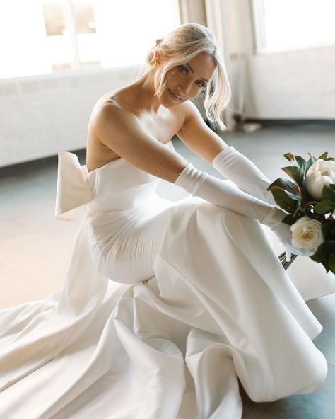 Oh just #RebeccasBride @al__dobro and her husband Tim looking like they belong on the COVER OF VOGUE 🤩👏 We can’t get enough of this absolutely stunning wedding! Love how Alexandria styled her strapless mikado mermaid dress with the bow, the long gloves, and the horsehair trimmed long veil 🙌Timeless perfection (also we’re getting iconic Elizabeth James vibes, iykyk 🥰) Congrats to these newlyweds! 🥂 Photos: @oliveandfigproductions Dress: @maggiesotterodesigns Veil: @ansoniabridalveils Gl... Gloves Bride Dress, Strapless Mikado Wedding Dress, Bride Gloves Long, Satin Wedding Dress With Gloves, Strapless Wedding Dress With Gloves, Wedding Dresses With Gloves, Wedding Dress With Gloves, Gloves Wedding Dress, Wedding Dress Gloves