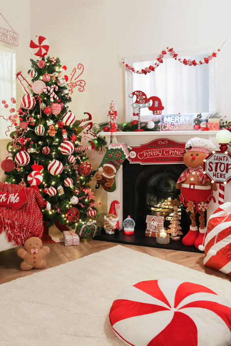 Celebrate a sweet Christmas with our Candy Cane Lane Collection this winter. Full of traditional reds and whites, this joyful collection is filled with a variety of stylish and bold baubles, ribbons, garlands, baubles and, of course, delicous-looking candy canes. Candy Cane Christmas Aesthetic, Candy Cane Lane Gingerbread House, Candy Cane Decor Ideas, Christmas Decor Ideas Candyland, Candy Cane Theme Decorations, Colorful Candy Photography, Candy Cane Lane Christmas Decor, Christmas Decor For Work, Candy Cane Lane Theme