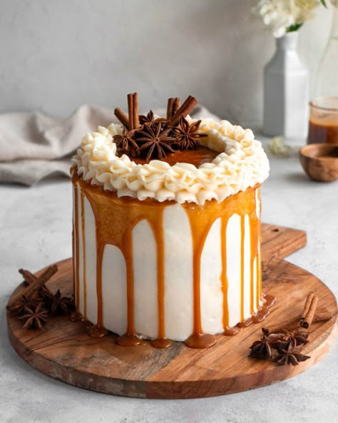 Autumn layered spice cake, iced with cream cheese frosting, and topped with salted caramel sauce. Salted Caramel Layer Cake, Bourbon Spice Cake, Spice Cake With Caramel Sauce, Salted Caramel Spice Cake, Spice Cake Decoration, Fondant Fall Cakes, Spice Cake With Caramel Frosting, Fall Birthday Cake Ideas For Women, Caramel Spice Cake