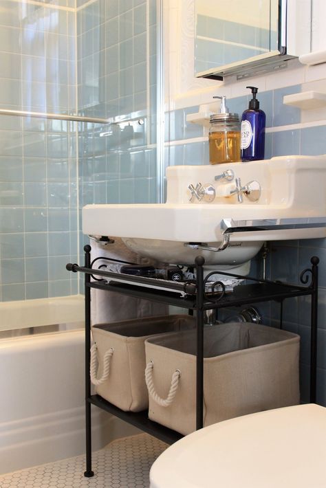 could I put a low bookshelf/hassock under my pedestal sink, to make it look like this?  hmmm... Small Bathroom With Pedestal Sink, Bathroom With Pedestal Sink, Pedestal Sink Storage, Ideas For Small Bathroom, Small Bathroom Storage Solutions, Bathroom Sink Organization, Bathroom Sink Storage, Small Bathroom Sinks, Ikea Bathroom