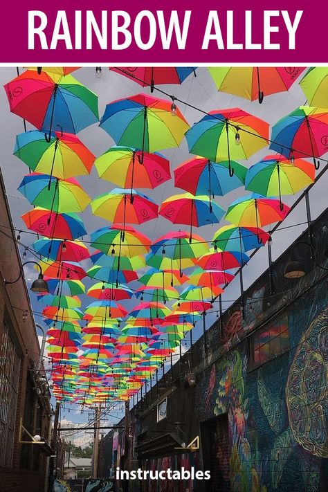 Suspend a collection of rainbow umbrellas in an alley setting to create shade and a beautiful art piece. #Instructables #outdoors #decor #pride Pride Photo Backdrop, Pride Festival Decorations, Pride Decorations Ideas, Pride Event Ideas, Festival Decorations Outdoor, Pride Picnic, Pride Month Ideas, Pride Decorations, Diy Umbrella