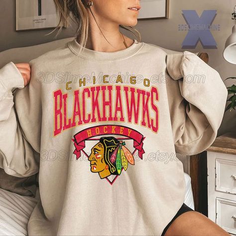 https://www.etsy.com/listing/1330430192/chicago-blackhawks-hockey-sweatshirt?click_key=a9092dd69ca7cd7d2bce4d0f81dd3c05ee9d6754%3A1330430192&click_sum=496d4112&ref=shop_home_recs_7&pro=1 Hockey Sweatshirts, Chicago Blackhawks Hockey, Blackhawks Hockey, Hoodie Aesthetic, Crewneck Vintage, Chill Outfits, You Perfect, Sweatshirt Crewneck, Fan Shirts