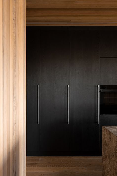 Dark kitchen's come no better than this. Charles Street by designer Annika Rowson. Cedar, oak and Portsea limestone define a kitchen where function is clear and style is bold. Buster + Punch hardware keeps the detail game solid. project / @annika_rowson⁠ architect / @threesixtyarchitecture⁠ photography / @parker Modern Black Cabinets Kitchen, High Gloss Black Cabinets, Ebonized Oak Cabinets, Nordic Longhouse, Longhouse Design, Colour Scheme Kitchen, Black Oak Kitchen, Dark Kitchen Ideas, Black Colour Scheme