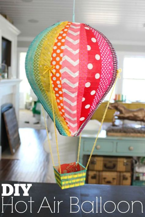 if you know me and DIY’s, you know you’re in for a long post! i’m not just going to show you how to make one hot air balloon, i’m going to show you how to make 17 different balloons!  3 or 4 times a y Air Balloon Diy, Balloon Pinata, Hot Air Balloon Craft, Diy Hot Air Balloons, Air Balloon Party, Hot Air Balloon Party, Hot Air Balloon Decorations, Kraf Kertas, Balloon Crafts