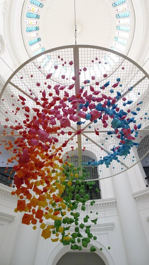 Giant, rainbow hanging installation of 1,000 origami spheres, fish and boats | Creative Boom Ceiling Art Installation, Origami Installation, Suspended Art, Colorful Objects, Installation Ideas, Origami Boat, Paper Installation, Ceiling Art, Origami Art