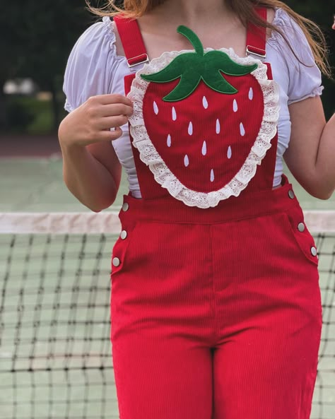 It’s strawberry summer~🍓 coming soon! — #cottagecore #strawberrydress #summeroutfit #springfashion #summerfashion #cottagecoreaesthetic #kawaiifashion #shopsmall #kitschy #kitschycute #whimsicalfashion #strawberrygirl #vintagestyle #dopaminedressing Strawberry Themed Outfit Aesthetic, Fruit Aesthetic Outfit, Strawberry Themed Outfit, Fruit Inspired Outfit, Cherry Inspired Outfit, Strawberry Overalls, Fruit Outfit, Fruit Clothes, Strawberry Clothes