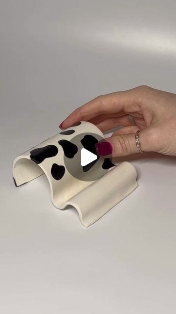 717K views · 44K likes | Sofi Sokolova on Instagram: "Clay Phone Holder🐮  Full tutorial on my YouTube channel (link in bio)  Here’s what you’ll need to create your masterpieces:  - air dry clay - acrylic paints - varnish gloss  #airdryclay #airdryclayart #claycraft #phoneholder #diyideas" Air Dry Clay Phone Stand, Pottery Air Dry Clay, Support Telephone Diy, Air Dry Clay Phone Holder, Air Dry Clay Glasses Holder, Phone Holder Clay, Clay Phone Holder, Picture Holder Diy, Airdryclay Ideas