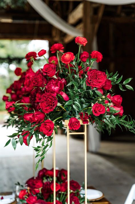 Tall Red Flower Arrangements, Red Roses Aisle Decor, Red Roses And Greenery Centerpiece, Red Roses And Eucalyptus Centerpiece, Red Flower Decoration Wedding, Red Rose Wedding Florals, Wine Red Wedding Theme Table Settings, Red Floral Centerpieces Wedding, Red Floral Arrangements Wedding