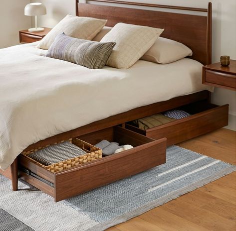 Simple pleasures… but now with storage. All the hits of the Lenia series — tapered legs, solid and veneered walnut, panel headboard, concealed joinery, an unadorned silhouette — plus four lovely deep drawers for your socks/blankets/book collection/etc. Compact Bed Frame, King Bed Built In Nightstand, Platform Beds With Drawers, Storage Queen Bed Frame, Wooden Bed With Drawer, King Bed Frame Storage, Queen Bed Frame With Drawers, Storage Bed Aesthetic, King Bedframe Ideas