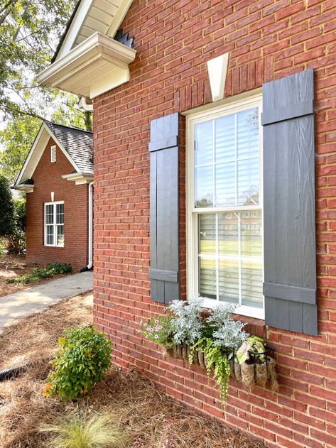 House Without Shutters, Shutters Brick House, Iron Window Boxes, Black Paint Colors, Window Baskets, Exterior Home Colors, Exterior Vinyl Shutters, Farmhouse Shutters, Outdoor Shutters