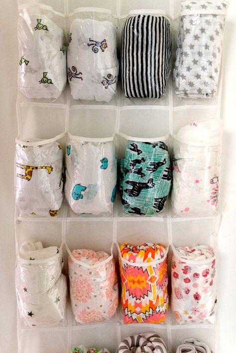 lucky andi: swaddle storage solution + our favorite swaddles Swaddle Storage, Aden Anais Swaddle, Solly Baby Wrap, Solly Baby, Bedroom Toys, Hanging Shoe Organizer, Hanging Shoes, Muslin Blanket, The Offspring