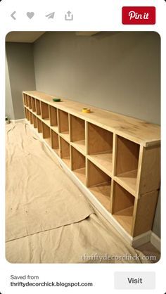 Built In Cubby, Built In Cubbies, Mud Room Garage, Thrifty Decor Chick, Basement Playroom, Basement Storage, Cubby Storage, Basement Bedrooms, Toy Room