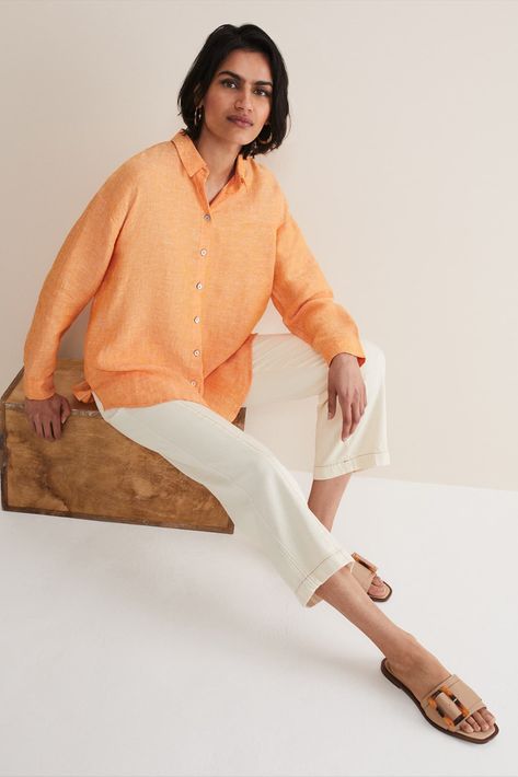 Our linen shirt will make a vibrant addition to your spring wardrobe. Designed in a sunny orange shade and cut in a relaxed fit, this shirt features a button through placket, long sleeves, collar and curved drop hem. This style is responsibly sourced. With no synthetic inputs, linen is a natural fibre with low environmental impact. Linen Blouses, Soft Design, Sustainable Fabric, Linen Jumpsuit, Natural Fibre, Linen Style, Linen Blouse, Phase Eight, Linen Trousers