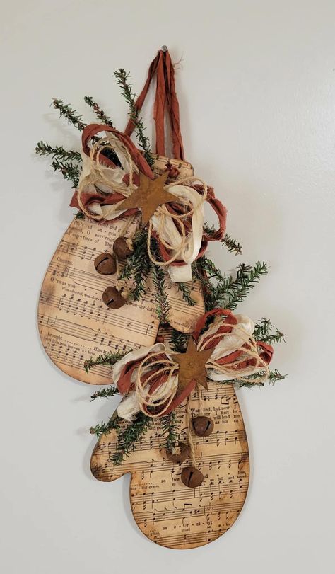 Hanging Door Decorations, Wood Mitten Craft, Round Flat Christmas Ornaments Diy, Rusty Christmas Ornaments, Stylish Fall Decor, Wooden Mittens Painted, Wood Cutout Christmas Decor, Rustic Wood Christmas Ornaments, Music Sheet Ornaments