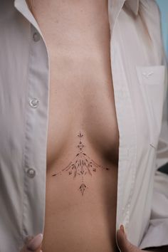 Tattoos Near Breast, Under Breast Tattoo Women, Tattoos Under The Breast, Sternum Tattoo Designs For Women, Tattoo Ideas Breast, Tattoo Breast Woman, Sternum Ornamental Tattoo, Tattoo Under The Chest, Tattoo Near Breast