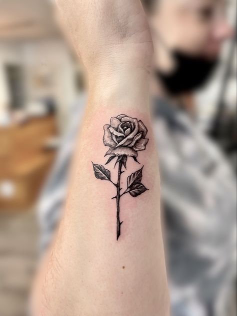 Rose Tattoos With Names Stem, Rose Shaded Tattoo, Black And White Rose Tattoo Forearm, Masculine Rose Tattoo Men, Rose Shading Tattoo, Solid Black Rose Tattoo, Heavy Shading Tattoo, Stem Rose Tattoo Design, Nick Tattoos Men