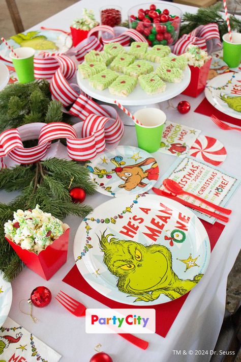 This classic Grinch themed Christmas tablescape will make your holiday celebration the most talked about this season! With Party City's extensive collection of Grinch decorations, tableware and Christmas party ideas, your party will be sure to stand out! Explore our Grinch Christmas collection and discover more holiday essentials at Party City!💚🎄​ Grinch Holiday Party, Grinch Themed Christmas, Christmas Decorations Party, Grinch Decorations, Grinch Christmas Party, Whoville Christmas, Grinch Christmas Decorations, Holiday Essentials, Decorations Party