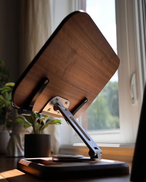 📖📚💻Upgrade your workspace with our 2-in-1 Adjustable Laptop Stand and Book Holder, crafted from luxurious black walnut wood. This premium, durable stand offers 360-degree adjustability for perfect viewing angles, blending functionality with elegance. Perfect for both laptops and books, it transforms your desk into a sophisticated, productive haven. 🎧 #WorkspaceGoals #LaptopStand #HomeOffice #BlackWalnut #DeskAccessories #ProductivityBoost #LuxuryDesign #TechGadgets #BookHolder #ErgonomicDesi... Laptop Stand Wood, Laptop Stand For Desk, Wooden Laptop Stand, Adjustable Laptop Stand, Apple Watch Stand, Laptop Tray, Home Studio Setup, 3d Art Drawing, Desk Tray