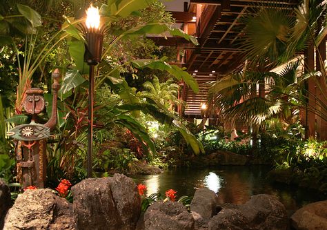 Outside the Polynesian entrance at night Poly Amorous, Resort Lobby, Garden Corner Ideas, Landscaping Garden Design, Blue Highlighter, Sophisticated Garden, Hawaiian Restaurant, Tiki Man, Disney Polynesian