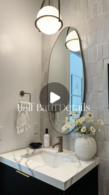 Christine Melin | Design • Home Decor • Lifestyle on Instagram: "Our half bath refresh continues to be a huge favorite with you all. I’ve linked everything I could in my LTK for you! Have a beautiful day🤍  •••VANITY FROM @willowbathandvanity•••  ✨Comment SHOP links!✨ (Be sure you’re following along so you receive them) •Also linked in my LTK   Powder bath  Powder room refresh  Powder room remodel  Half bath refresh  Half bath remodel  Half bath renovation  Organic modern  Modern organic  Neutral bathroom  Bathroom reno  Must see renovation  Bathroom tile  Reeded vanity  Organic tile" Half Bath Off Kitchen, Half Bathroom Sink Ideas, Half Bath Backsplash Ideas, Tiled Half Bath, Designer Powder Rooms, Organic Modern Half Bath, Transitional Half Bathroom Ideas, Modern Organic Powder Room, Organic Powder Room