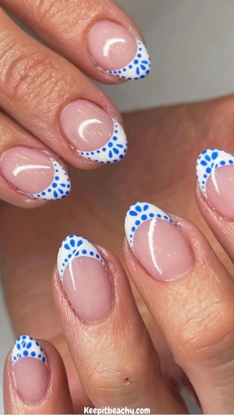 These blue and white french tip nails quite literally nail the coastal granddaughter aesthetic PERFECTLY. I am loving all of these summer nail ideas.   Photo by: @nailsbyswayz French Tip Blue Design, White And Blue Tip Nails, One French Tip Nail, White French Tip With Blue Dots, Nail Inspo￼, White French Tips With Blue Design, Blue Nails With White French Tip, Costal Nail Ideas, Cute Nails Designs For Acrylics