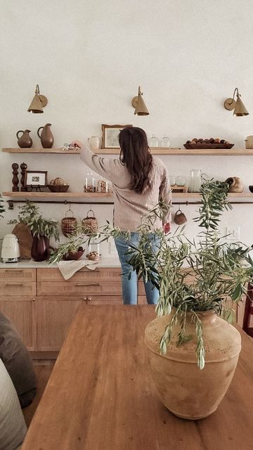 Long Floating Shelf Kitchen, High Shelf Dining Room, How To Style Long Shelves, Wood Shelves Dining Room, Dining Room Wall Shelving, Long Shelf Kitchen Wall, Long Shelf Dining Room, Natural Wood Floating Shelves Kitchen, Dining Floating Shelves