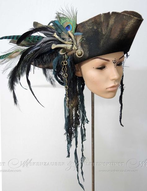 + + + Piracy Hat + + + The pirate-hat is made of aged premium woolfelt. It is adorned with bones, various feathers, chains, buttons and textile materials. The hat is available in sizes between: 54 & 64 Size -> Circumference of your head in cm + + + + + + +++ Pirate Hat +++ The daring Authentic Pirate Hat, Pirate Hat With Feathers, Big Pirate Hat, Brown Pirate Hat, Diy Captain Hook Hat, Pirate Hats Diy, Pirate Hat Women, Decorated Pirate Hat, Pirate Hat Design