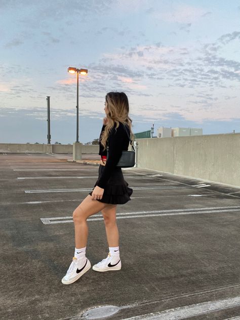 Nike Blazers Shorts Outfit, Fall Fits With Nike Blazers, Mid Nike Blazer Outfit, Black Dress With Nike Blazers, Nike Blazers With Nike Socks, How To Dress Up Nike Blazers, Black Nike Skirt Outfit, Nike Blazer 77 Outfit Womens, Nike Blazer Dress Outfit