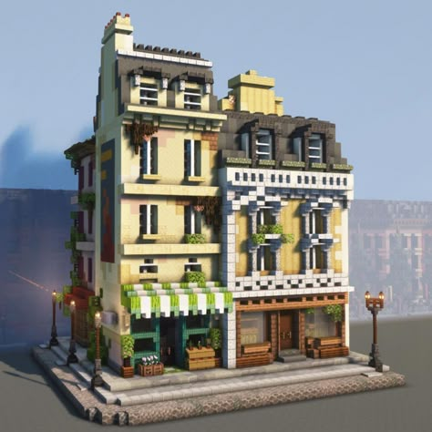 Blaze on Instagram: “Today’s post is a Paris street corner. . It features 4 buildings, a lamppost, awnings, chimneys, a flower stand, 2 posters, ivy, dormers…” Minecraft Modern Townhouse, Townhouse Minecraft Ideas, Minecraft City House Ideas, Minecraft Urban Houses, Minecraft French Building, Town Houses Minecraft, Minecraft Street Design, Minecraft Corner Store, Minecraft Houses City