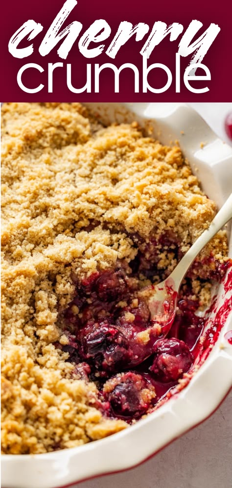 A close up view of a pan of cherry crumble with a spoon sticking out. Cherry Cobbler Fresh Cherries, Cherry Crisp Recipe With Canned Cherries, Fruit Crumble Topping, Cherry Crisp Recipe With Frozen Cherries, Berry Crisp Recipe Crumble Topping, Cherry Crumble Pie Recipe, Cherry Crumble Cake, Best Cherry Cobbler Recipe, Cherry Crisp With Frozen Cherries