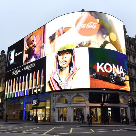 Piccadilly Circus billboard uses recognition technology to deliver adverts  ||  A new digital billboard in London's Piccadilly Circus uses recognition technology to display targeted advertisements based on real-time demographics. https://www.dezeen.com/2017/11/10/piccadilly-circus-digital-billboard-screen-targeted-advertisements-algorithm-news-technology/?utm_campaign=crowdfire&utm_content=crowdfire&utm_medium=social&utm_source=pinterest History Of Advertising, Digital Billboard, Digital Signage Displays, Stage Equipment, Bus Shelters, Sign Board Design, Facial Recognition Technology, Billboard Advertising, Bank Design