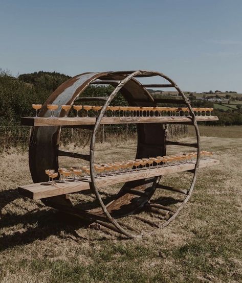 Farm Wedding Seating, Hay Feeder Wedding Arch, Bale Feeder Wedding Arch, Round Bale Feeder Wedding Arch, Hay Ring Ideas, Farm Themed Wedding Ideas, Wedding In A Pasture, Diy Field Wedding, Country Themed Wedding Decorations