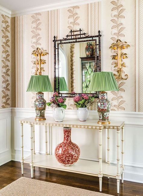 Interior designer James Farmer brought the verdant views indoors with garden and floral motifs. Here, hydrangeas on the wallpaper climb the entry walls. Photography by Jeff Herr. Wallpaper: "Hydrangea Drape" by Schumacher Chinoiserie Entryway, James Farmer, Flower Magazine, Living Room Mantel, Southern Traditional, Beautiful Entryways, Trellis Wallpaper, Table Decorating, Sandberg Wallpaper