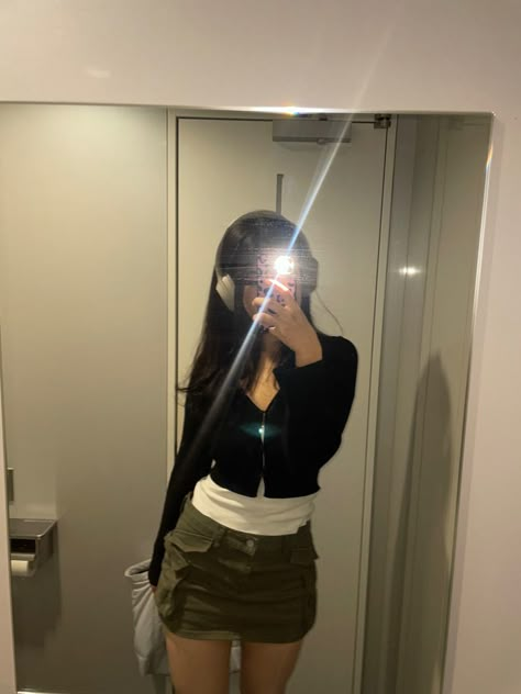 cargo skirt black cardigan mirror selfie Style Cargo Mini Skirt, Green Cargo Skirt Outfits Y2k, Mini Green Skirt Outfit, Button Up Denim Skirt Outfit, Winter Cargo Skirt Outfit, Cargo Skirt With Tights, Acubi Style Skirt, Gray Cargo Skirt Outfit, Y2k Cargo Skirt