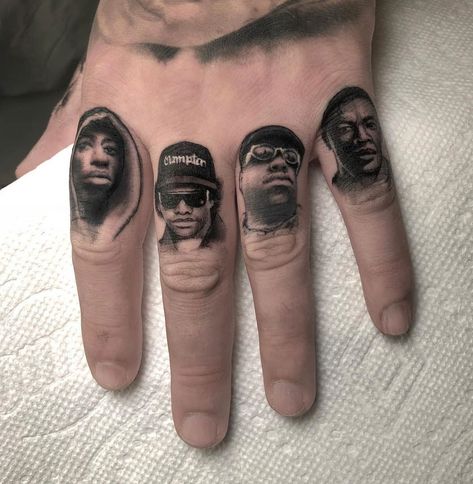 Rapper fingers, 2Pac, Eazy-E, Biggie & Dr. Dre. Tattoos by Veronique Imbo, an artist at Loveless Tattoo in Montreal, Canada. 2pac Tattoos, Tupac Tattoo, Hop Tattoo, Hip Hop Tattoo, Best Tattoo Ever, Gangsta Tattoos, Tattoo Templates, Finger Tattoo, Incredible Tattoos