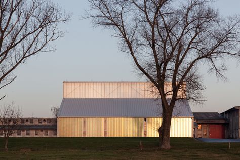 Gallery of White Shed / Atelier 111 Architekti - 2 White Shed, Arch Facade, Community House, Truss Structure, Timber Architecture, Metal Facade, Agricultural Buildings, Stone Granite, Roof Lantern